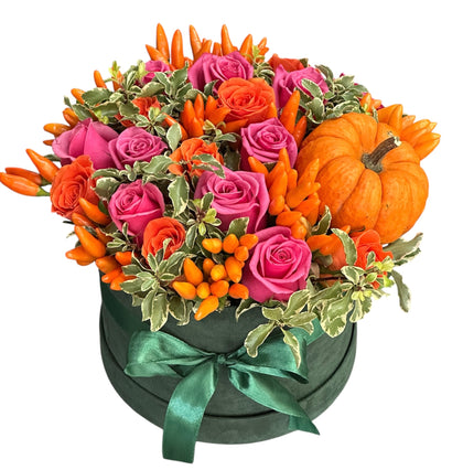 Orange and Pink Flowers in Box with Pumpkin