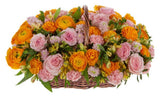 Basket of Orange Ranunculus in Pink - Flowers Box London