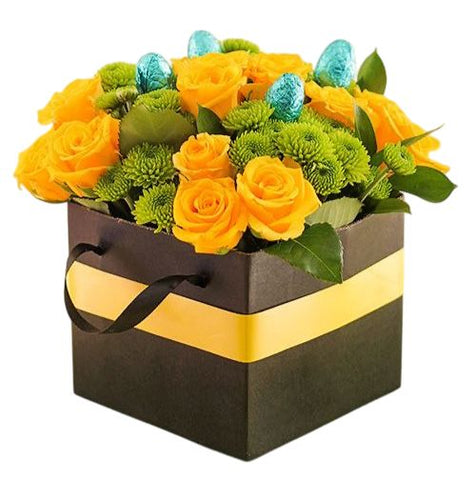 Bright Box of Yellow and Green Flowers with Chocolate Eggs