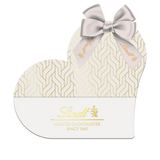 Indulge in Romance: Lindt Heart Box with 100g of Milk Lindor Chocolate Hearts