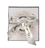 A Luxurious Gift Box with delicious, unusual flavors of Lindt Truffles.