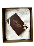 A Luxurious Gift Box with delicious, unusual flavors of Lindt Truffles.