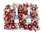 Cymbidium Flowers in a box with Bottles of Prosecco