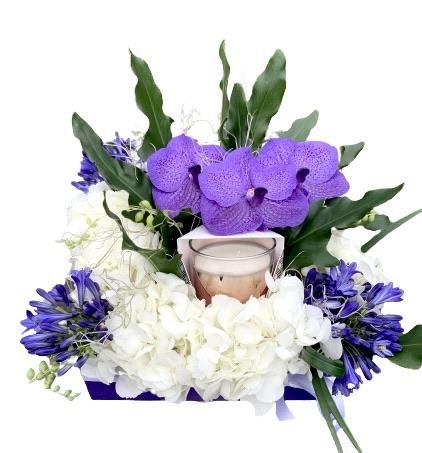 Purple Flower Box with a Candle