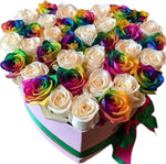 White and rainbow roses in heart box