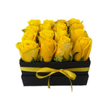 Yellow roses in a box