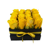 Yellow roses in a box